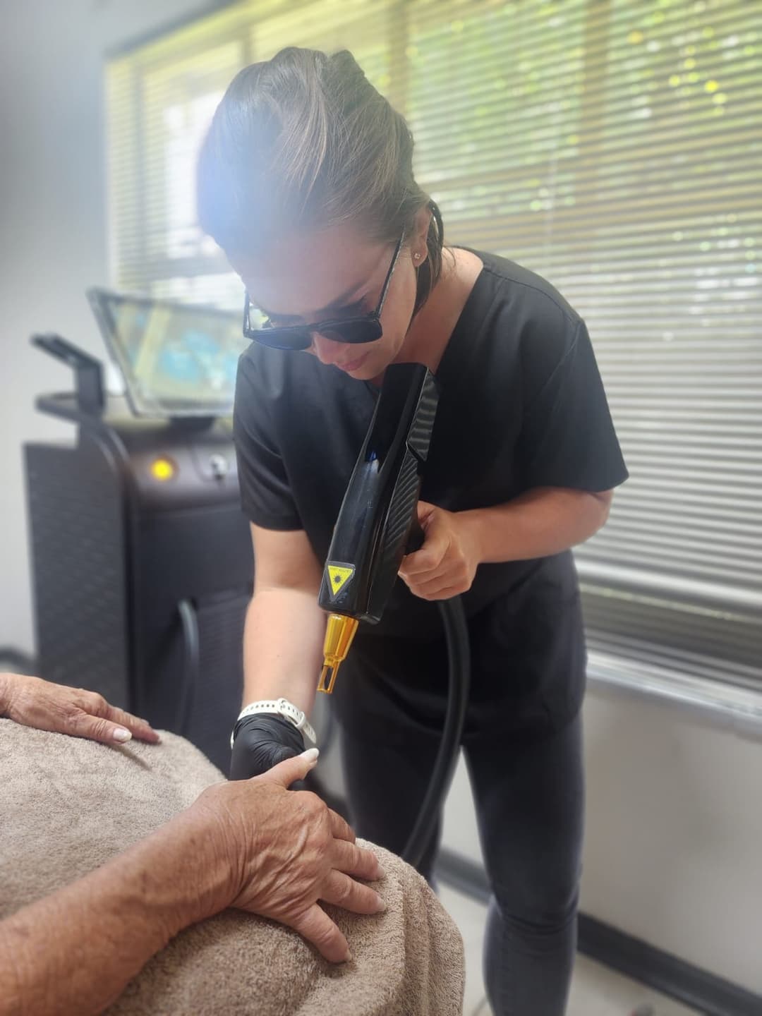 Skin treatment in progress at Olivia salon